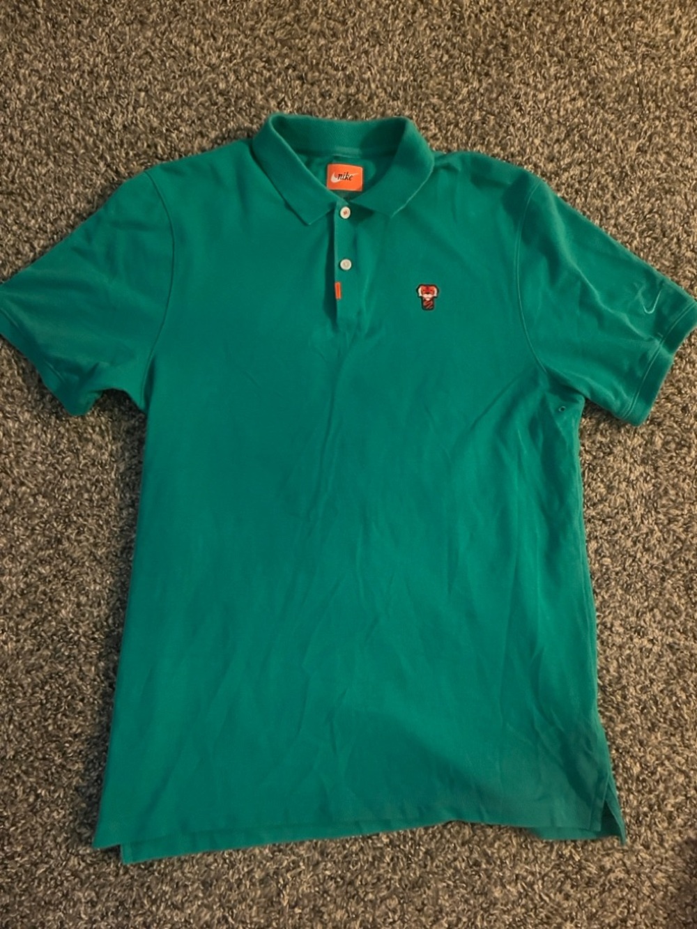 Nike Teal Green Polo with Embroidered Chest Patch